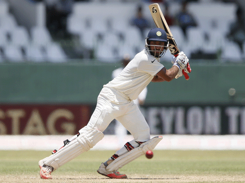 India's Pujara plays a shot during the second day of their third and final test cricket match against Sri Lanka in Colombo.Reuters Photo