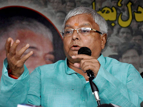 RJD chief Lalu Prasad speaks during a press conference in Patna on Saturday. PTI Photo
