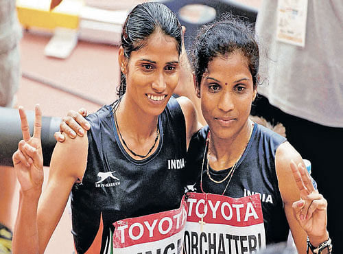 GRITTY SHOW India's OP Jaisha (right) and Sudha Singh after finishing 18th and 19th respectively in marathon. PTI