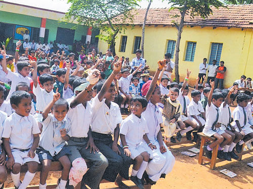 glory returns Cheerful students at Madahalli School, Mandya.