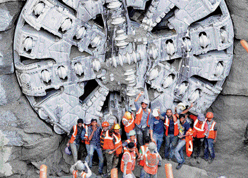 Namma Metro workers celebrate after tunnel boring machine  Krishna achieved a breakthrough at the Chickpet underground station on Monday. Dh photo