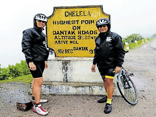 enthusiastic Sarvesha Samaga (right) with another cyclist.