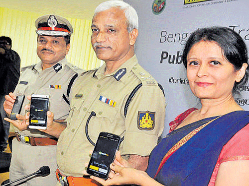 City Police Commissioner NS Megharikh launches 'New Public Eye' app Additional commissioner of police (Traffic)MA Saleem, Co-founder - Janaagraha Swati Ramanathan are seen.