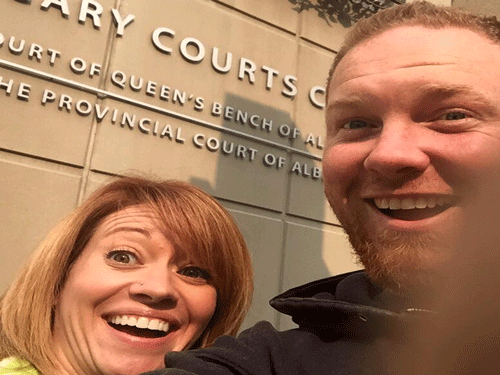 The Canadian couple - Chris and Shannon Neuman - clicked the picture outside Calgary Courts Centre in downtown Calgary soon after filing for divorce. Picture courtesy: Facebook