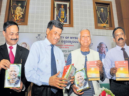 Nobel laureate Muhammad&#8200;Yunus releases the Kannada version of his biography 'Badavara Banker', translated by principal of&#8200;SBRR&#8200;Mahajana&#8200;First&#8200;Grade&#8200;College K&#8200;V&#8200;Prabhakara (extreme left) at the Senate Hall of the University of Mysore, Mysuru, on Friday. Vice chancellor K&#8200;S&#8200;Rangappa and Registrar C&#8200;Basavaraj are with them. DH photo