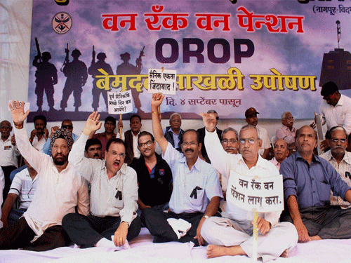 Members of United Front of Ex-servicemen shout slogans during their indefinite hunger strike over non-implementation of One Rank One Pension (OROP) near Vidhan Bhawan in Nagpur, Maharashtra. PTI Photo.