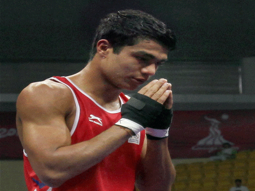 The 23-year-old Indian lost 0-2 to the reigning Youth Olympic champion in a gruelling fight that left both the boxers with several bruises on their faces. PTI File Photo.
