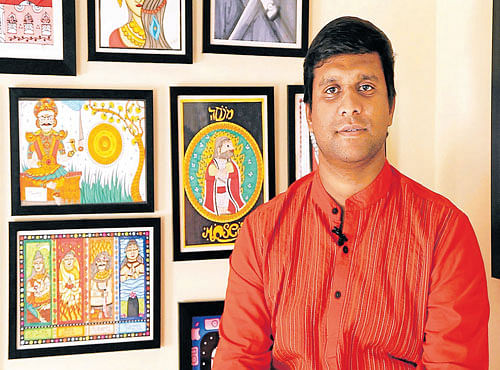 Balaji with some of his artworks