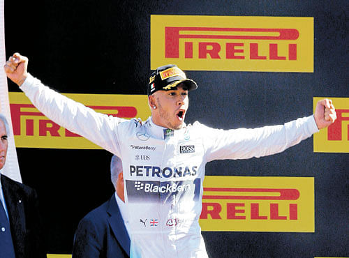 UNSTOPPABLE: Mercedes' Lewis Hamilton celebrates after winning the Italian Grand Prix on Sunday. REUTERS