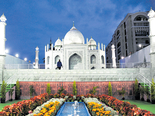 Malaysian artist Shekar has created awooden replica of Taj Mahal which is on display on Bannerghatta Road. DH PHOTO