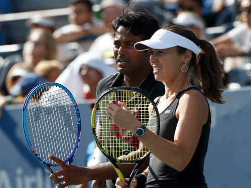 Hingis and Paes became the first duo to capture three major mixed titles in the same year since Margaret Court and Marty Riessen achieved the feat in 1969. Reuters photo