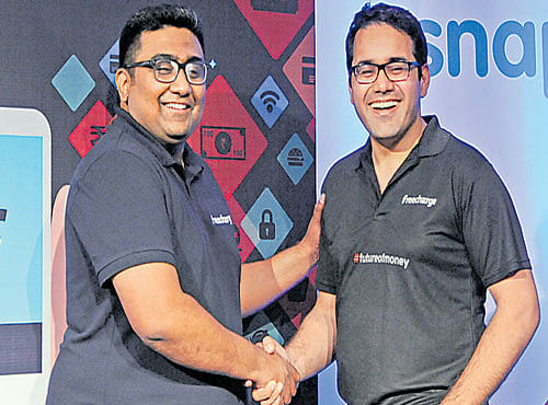 FreeCharge CEO Kunal Shah (left) with Snapdeal CEO Kunal Bahl in Bengaluru on Tuesday. DH PHOTO