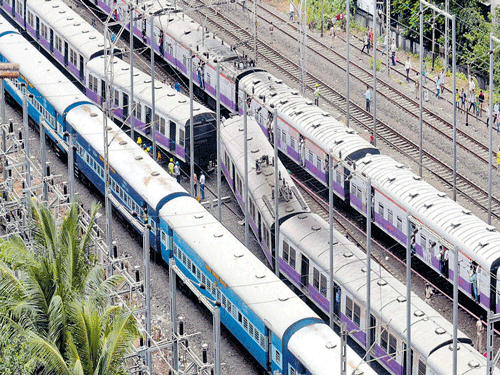 Several coaches of a Western Railway train derailed near Vile Parle station in Mumbai on Tuesday. PTI
