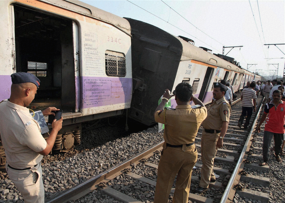 Yesterday, seven coaches of a Churchgate-bound fast local train came off the tracks on Western Railway line leading to a blockage of three lines between Andheri and Vile Parle causing a great deal of inconvenience to thousands of commuters as services came to a grinding halt for hours. PTI file photo