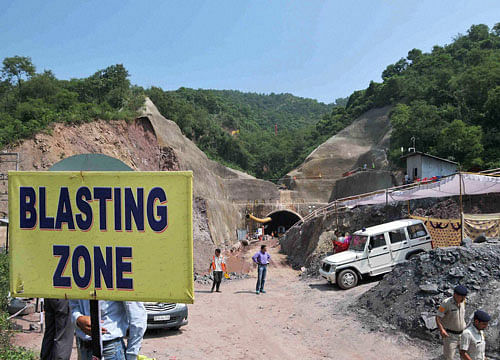 A view of the sport where three laborers have been trapped since Saturday evening when the under-construction tunnel of Kiratpur-Manali four-lane road project collapsed, at Tihra in Bilaspur district of Himachal Pradesh. PTI photo
