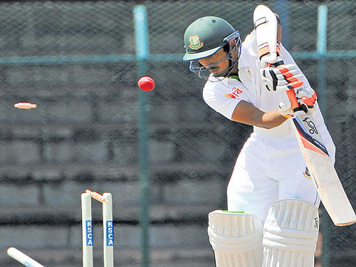 quick work: Anamul Haque of Bangladesh 'A' is clean bowled by Prasidh Krishna on the first day in Mysuru on Tuesday.  dh photo/ prashanth H G