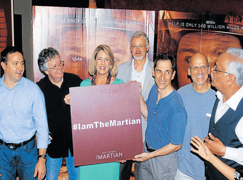 (From L to R) NASA scientists Tom Hilleary, Steve Volz, Kerry Sawyer, David Turner, Jonathan Margodis, Fernando Echavarria with ISRO's Mars programme director S Arunan, at the premiere of 'The Martian' in City on Thursday. DH PHOTO