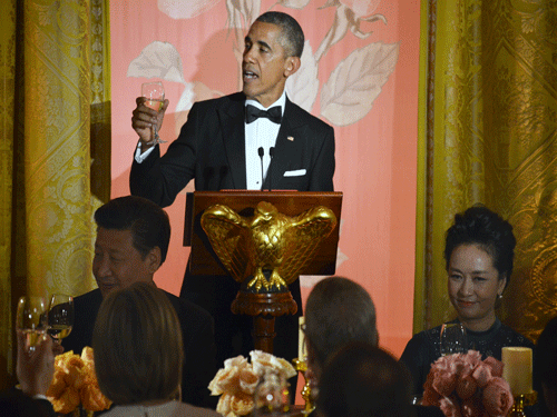 Obama welcomes Xi and Peng for a State Dinner in Washington. Reuters