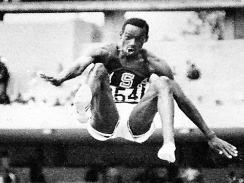 Bob Beamon winning the gold at the 1968 Mexico Olympic Games.