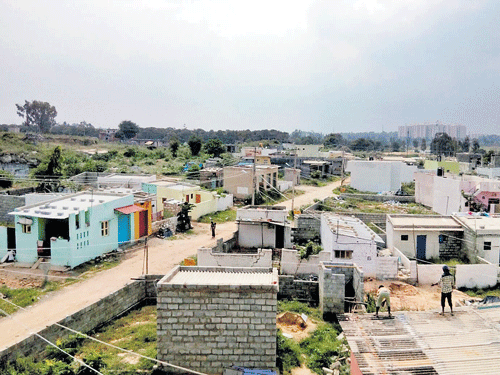 under scanner: Residents of these houses face an uncertain future. dh Photo
