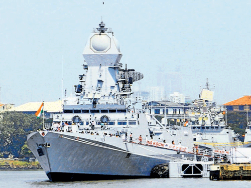 formidable: Defence Minister Manohar Parrikar on Wednesday commissioned INS Kochi, the second of the Kolkata-class guided missile destroyer&#8203;, at the Naval Dockyard, in Mumbai, on Wednesday. DH Photo