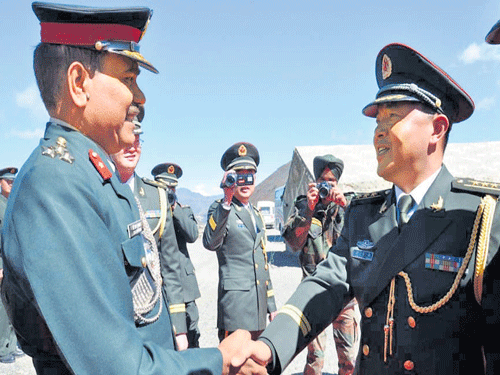 The Peoples' Liberation Army of China and Indian&#8200;Army forces greet to mark the Chinese National Day. In the meeting, both sides agreed to increase mutual cooperation for  better border management along the Arunachal frontier.