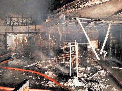 uncontrolled inferno: The fire broke out in the Marathahalli store of Brand Factory around 3.30 am on Friday, quickly spreading to every part of the five-storey building and destroying almost all goods and furniture. dh photos