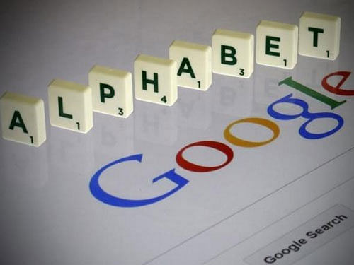 Letters spell the word ''Alphabet'' as they are seen on a computer screen with a Google search page in this photo illustration taken in Paris. Reuters photo
