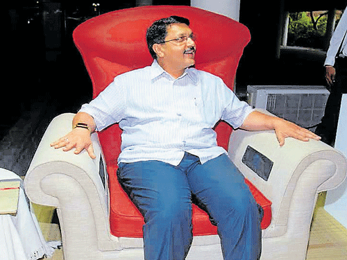 A man enjoys the comforts of a AC sofa in Ahmedabad.