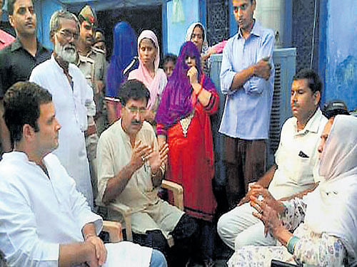 Congress vice-president Rahul Gandhi meets family of Mohd Akhlaq at Bisara village in Dadri on Saturday. PTI Photo