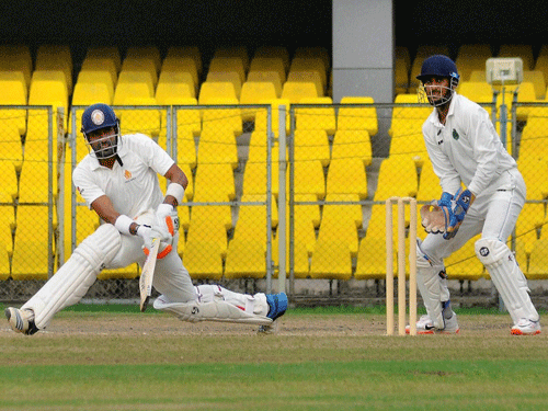Karnataka batsman Robin Uthappa plays a shot on the 3rd day of Ranji Trophy match against Assam in Guwahati on Saturday. PTI Photo.