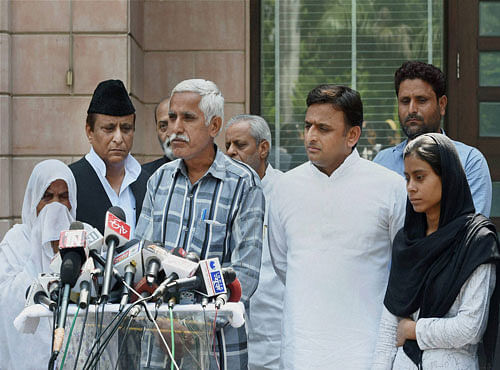 Condolence visit: Family members of Akhlaq address the media in Lucknow on Sunday, along with Uttar Pradesh Chief  Minister Akhilesh Yadav. PTI Photo