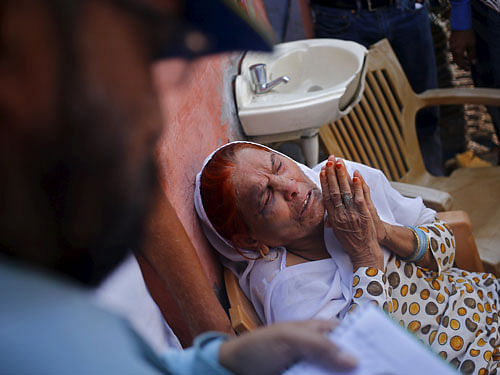 Asgari, mother of Saifi, who was killed by a mob mourns his death inside her house at Bisara village in Uttar Pradesh, Reuters file photo