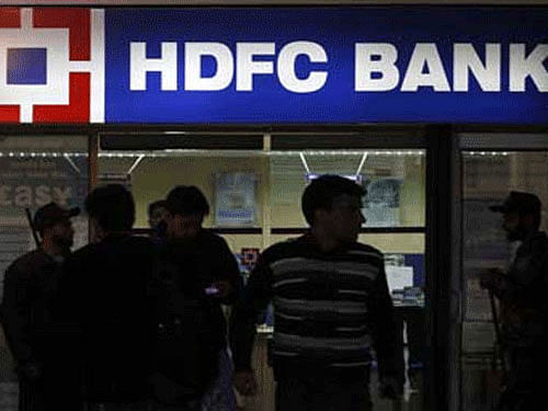 HDFC today cut benchmark lending rate on housing loans by 0.25 per cent to 9.65 per cent, a move which will lower the EMI for borrowers. PTI File Photo