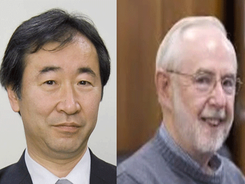 Takaaki Kajita of Japan and Arthur McDonald of Canada. Reuters Photo and Screen grab.