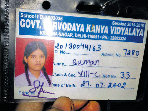 The identity card of Suman Singh, who was hit by stray  bullets from a neighbourhood scuffle. DH Photo