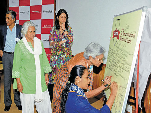 Participants sign a charter during a workshop on policy reforms in primary and higher education in Bengaluru on Wednesday. DH&#8200;photo