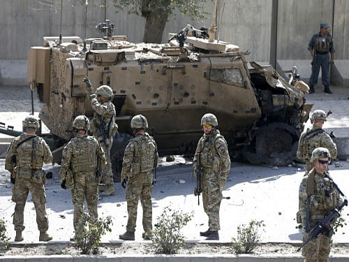 The crash came just hours after a Taliban suicide car bomber struck a British forces convoy in central Kabul, wounding at least three civilians including a child, Afghan officials said. No British casualties were reported. Reuters photo