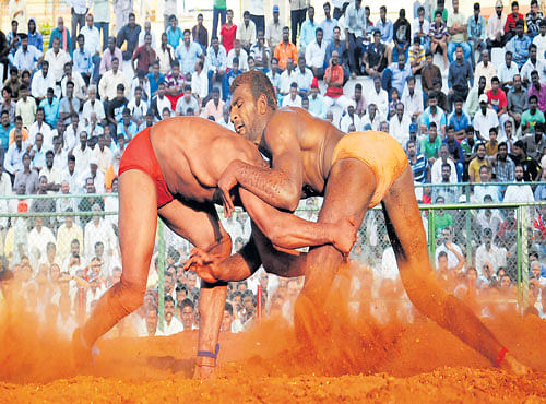 CONTINUING A LEGACY Glimpses of agaradi mane; wrestlers participating in the Dasara Wrestling Tournament. DH PHOTOS