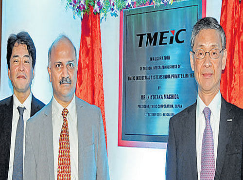 TMEiC DGM Juro Hara, TMEiC India Managing Director Hemant Joshi, and TMEiC Chief Executive Officer Kiyotaka Machida in Bengaluru on Monday. DH PHOTO