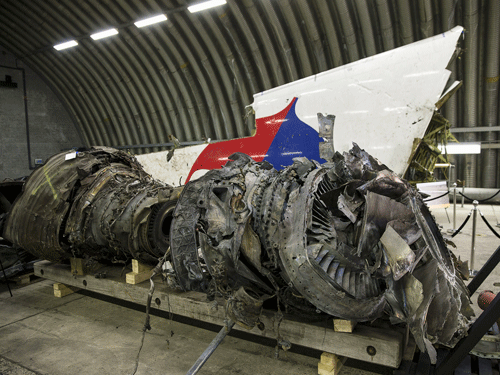 reckage of the MH17 airplane is seen after the presentation of the final report into the crash of July 2014 of Malaysia Airlines flight MH17 over Ukraine in Gilze Rijen, the Netherlands, October 13, 2015.  Reuters Photo.