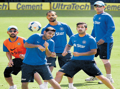 FUN BEFORE ACTION: Indian players enjoy a game of football during a practice session on the eve of their second ODI against South Africa at Indore. PTI