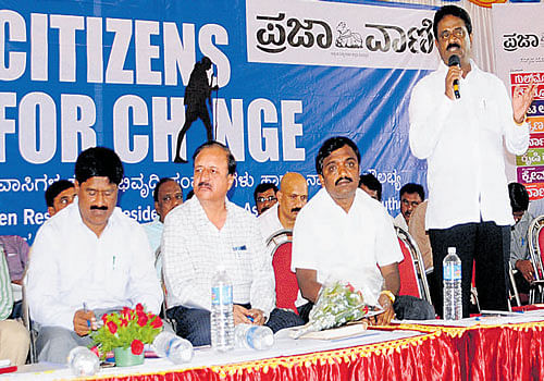 Dasarahalli MLA Muniraju speaks at the Citizens for Changeevent organised by Deccan Herald and Prajavani on Saturday. Photo/ B H Shivakumar