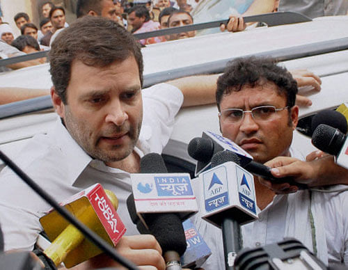 Congress Vice President Rahul Gandhi talking to media during a visit to Sunpedh village where a dalit's house was set on fire allegedly by men belonging to the upper-caste community, in Ballabhgarh in Faridabad on Wednesday. PTI Photo
