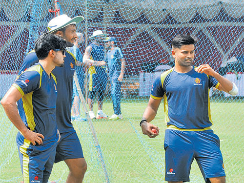in high spirits Karnataka skipper R Vinay Kumar (right) makes a point to team-mates  Manish Pandey (left) and HS Sharath in Mysuru on Wednesday. DH photo/ prashanth hg