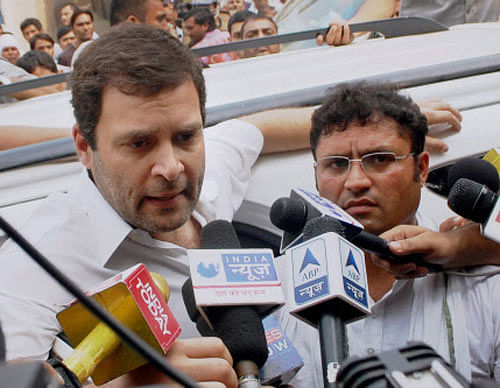 Congress Vice President Rahul Gandhi talking to media during a visit to Sunpedh village where a dalit's house was set on fire allegedly by men belonging to the upper-caste community, in Ballabhgarh in Faridabad. PTI photo