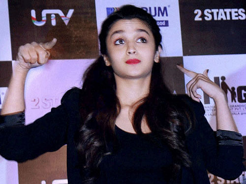 'I'm not standing opposite her (Kareena) in 'Udta Punjab'. There are four different tracks in the film. Her track is different from mine. Similarly, Shahid and Diljit Dosanjh will have their own track,' said Alia. PTI file photo