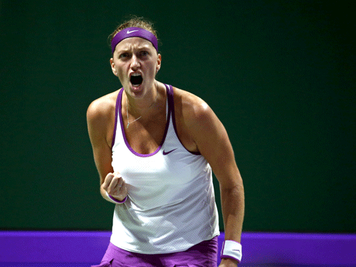 Petra Kvitova of the Czech Republic celebrates a point against compatriot Lucie Safarova during their women's singles tennis match of the WTA Finals at the Singapore Indoor Stadium October 28, 2015. Reuters Photo.