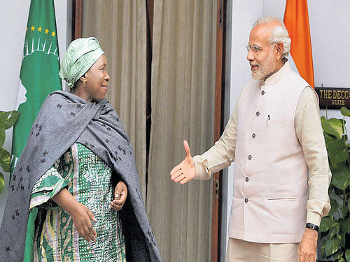 All smiles: Prime Minister Narendra Modi greets African Union Commission chairperson, Nkosazana Dlamini Zuma at Hyderabad House, in New Delhi on Wednesday. PTI