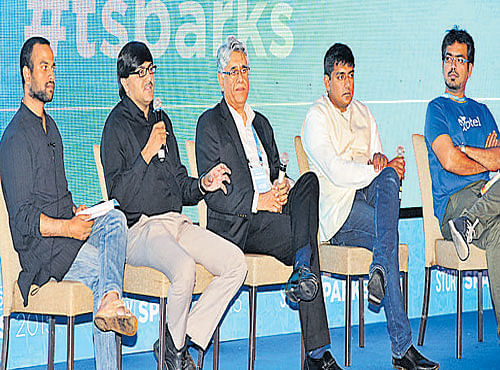 Reverie Language Technologies Co-Founder Arvind Pani, Alok Soni fromYourStory, Process9 Co-founder and CEO Rakesh Kapoor, Airloyal founder and CEO Raja Hussain and Exotel Techcom Co-founder Ishwar Sridharan participate in a discussion during the TechSparks organised by YourStory in Bengaluru on Friday. DH PHOTO